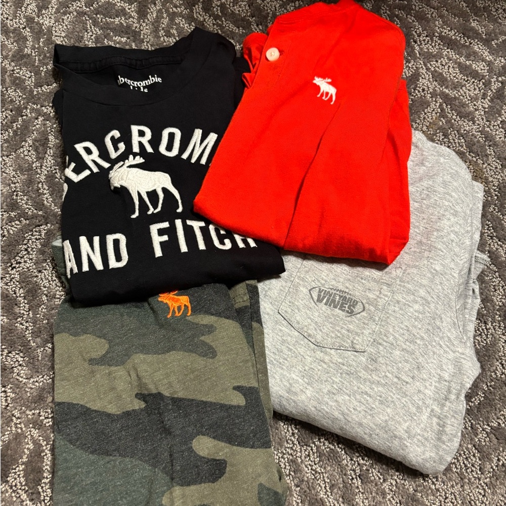 3 Abercrombie Kids t-shirts and 1 long sleeve Vineyard vines T-shirt.